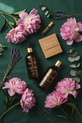 Bloom Mama Mother's Day Bundle flat lay with peonies and botanicals